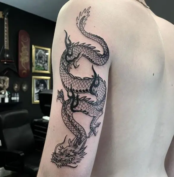 Black and Grey Dragon Back of Arm Tattoo