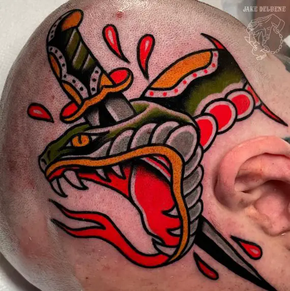 Colorful Snake and Dagger Head Tattoo