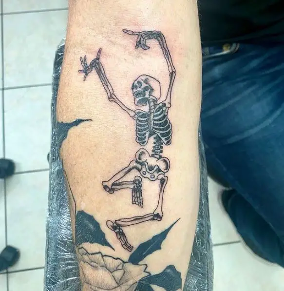 Dancing Skeleton Forearm Tattoo
