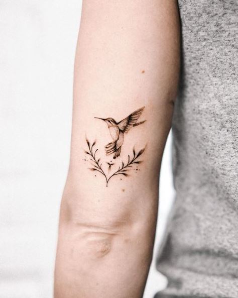 Flying Humming Bird Back of Arm Tattoo