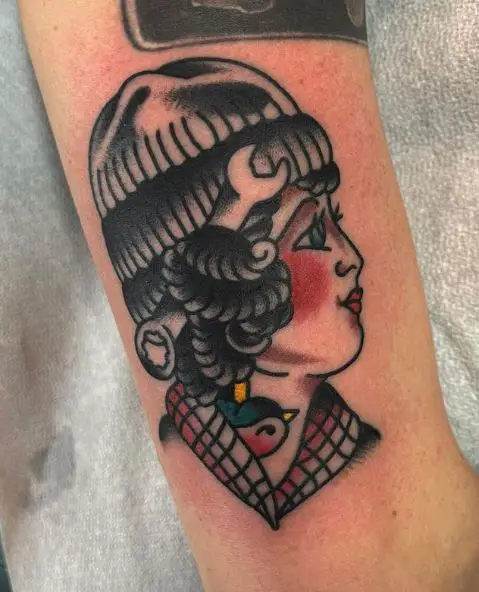 Girl's Head with a Wrench Headpiece Tattoo