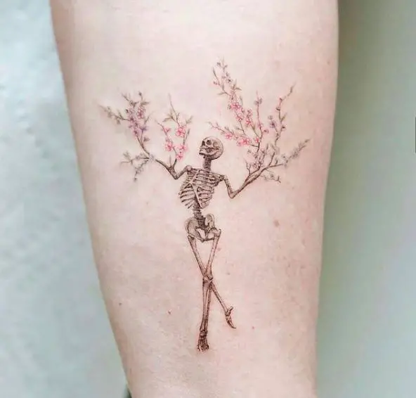 Greyscale Skeleton with Flowers Tattoo