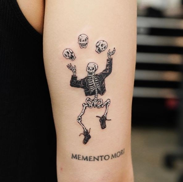 Happy Face Juggling Skeleton Arm Tattoo