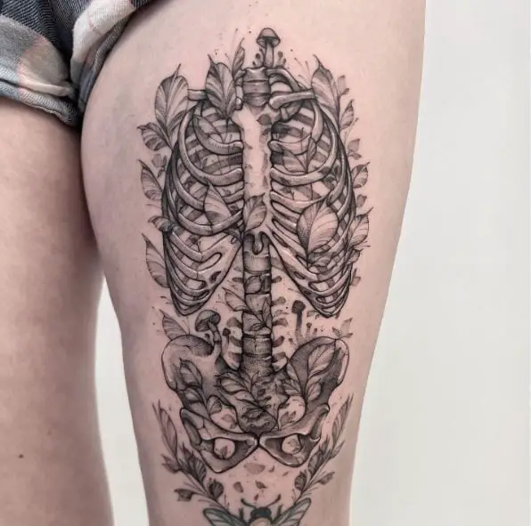 Leafy Skeleton Thigh Tattoo