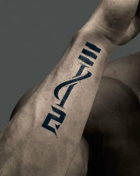 Male Name in Shapes of Arabic Font Tattoo