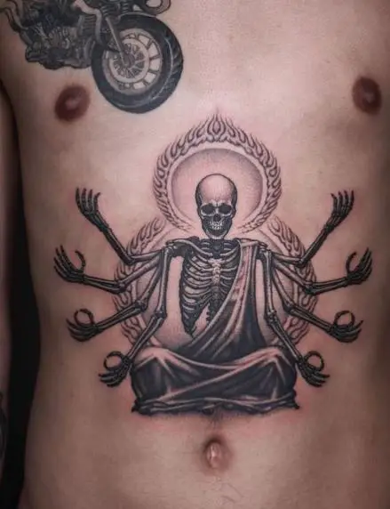 Meditating Skull Tattoo on the Tummy