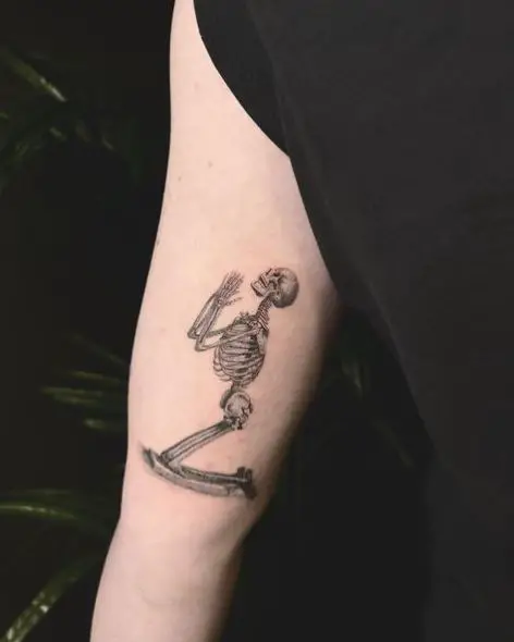 Medium Sized Praying Skeleton Arm Tattoo