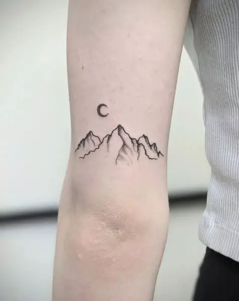 Mountain and Moon Back of Arm Tattoo