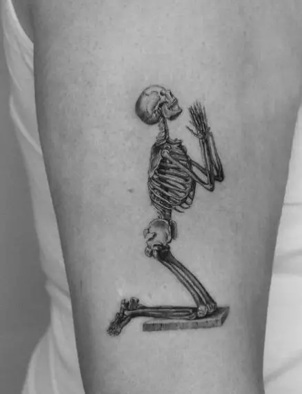 Praying Skeleton Arm Tattoo