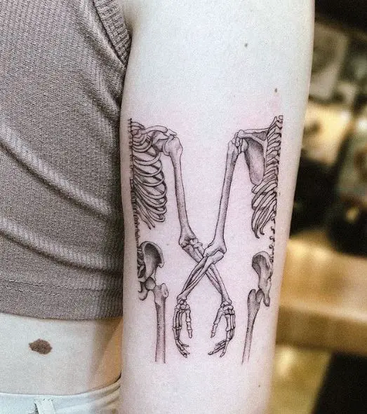 Skeleton Couple Back of Arm Tattoo