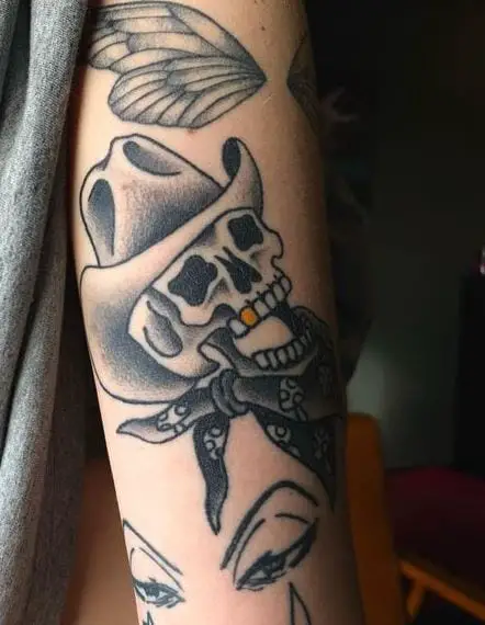 Skull Head with Hat and Scarf Back of Arm Tattoo