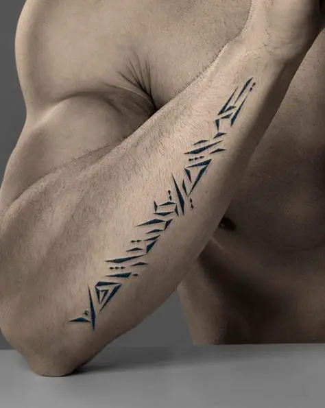 Spiky Style Arabic Quote Tattoo