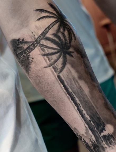 Sunset Beach and Palm Tree Forearm Tattoo