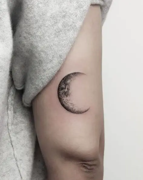 Waning Crescent Moon Back of Arm Tattoo