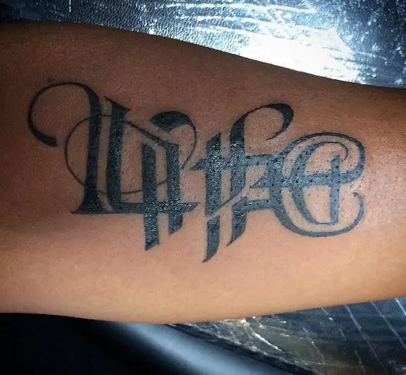 Black Life and Death Ambigram Forearm Tattoo