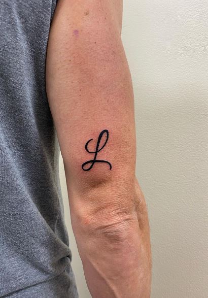 Calligraphic Simple Letter L Initial Arm Tattoo