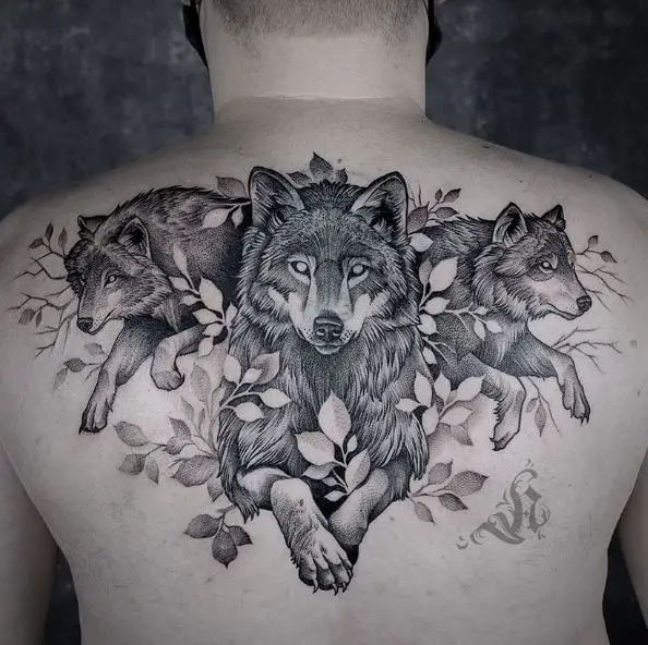 Leaves and Pack of Wolves Back Tattoo