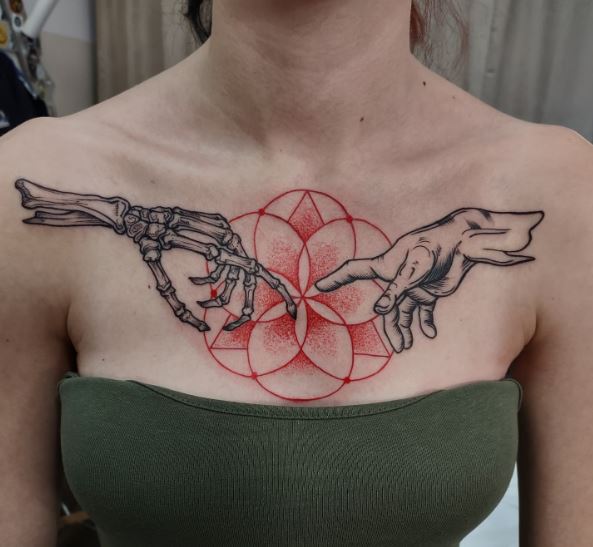 Skeletal Hand and Human Hand with Circles and Triangle Chest Tattoo