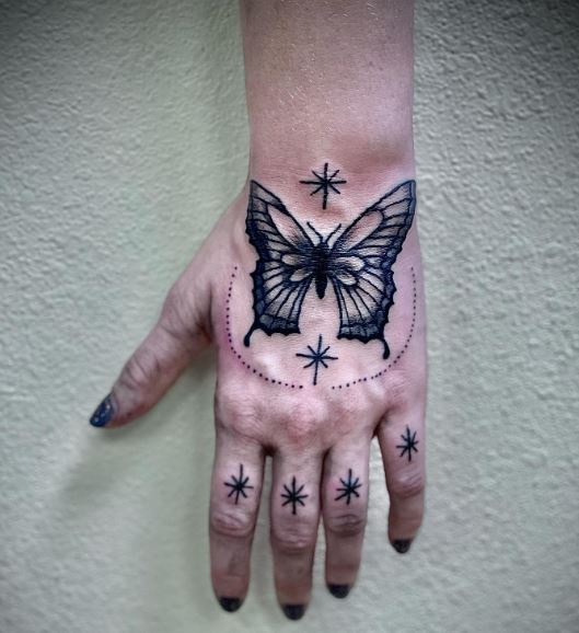 Butterfly and Stars Hand and Knuckles Tattoo