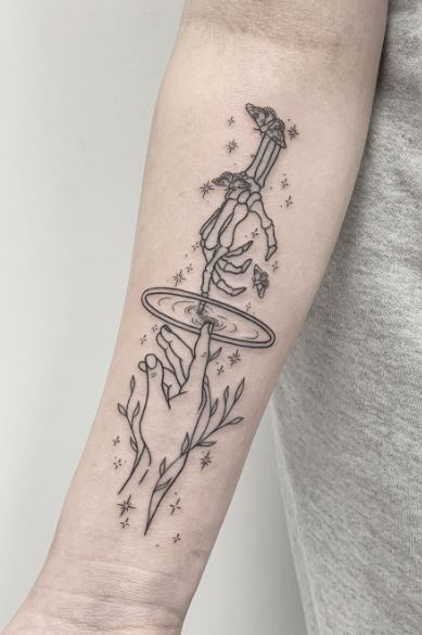 Touching Skeletal Hand and Human Hand Forearm Tattoo