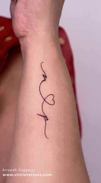 Handwritten Initial Letters with Heart Forearm Tattoo