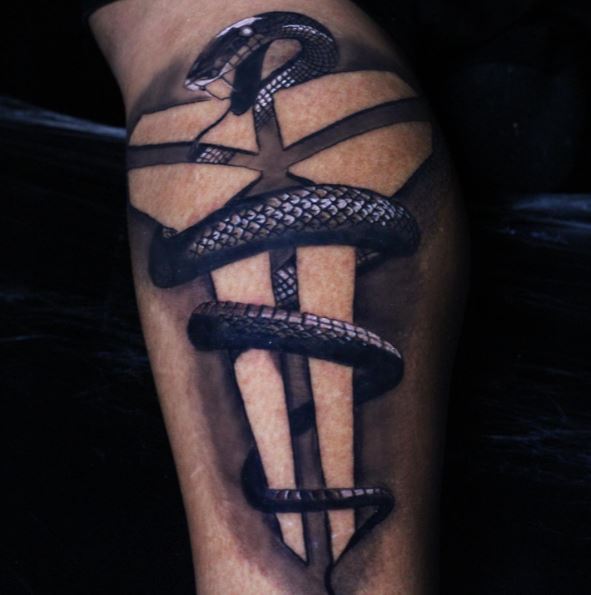 Glowing Black Mamba with Kobe Bryant Logo Leg Tattoo