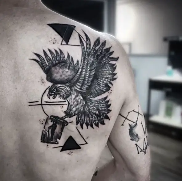 Black and Grey Attacking Eagle Back Tattoo