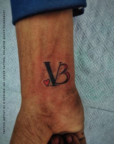 Initial Letters VB with Heart Wrist Tattoo