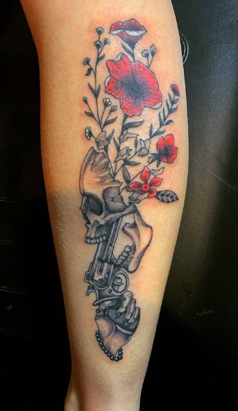 Floral Skull and Human Hand with Revolver Forearm Tattoo