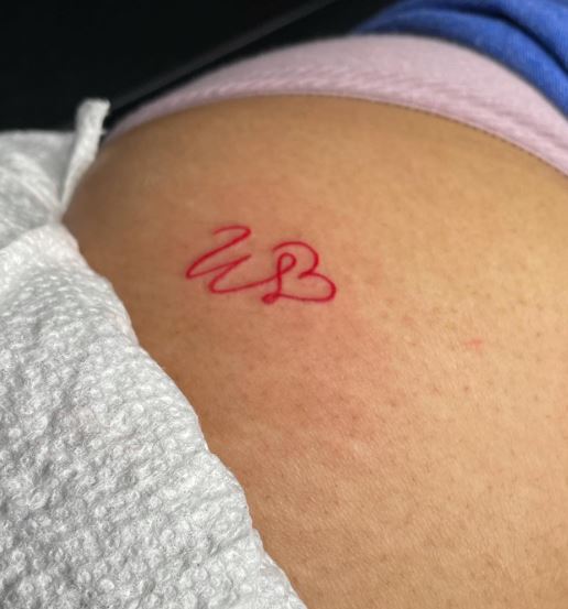 Red Handwritten Initial Letter W with Heart Tattoo