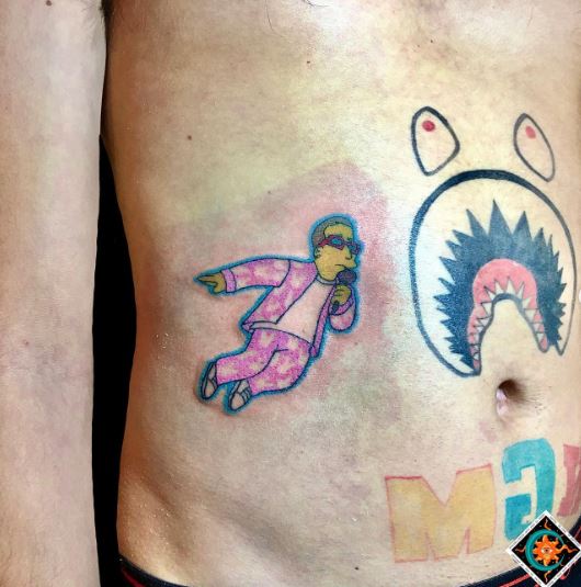 Colorful Bart Simpson as Bad Bunny Stomach Tattoo