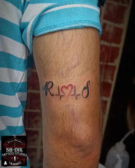 Calligraphic Initial Letters RS with Heart and ECG Arm Tattoo