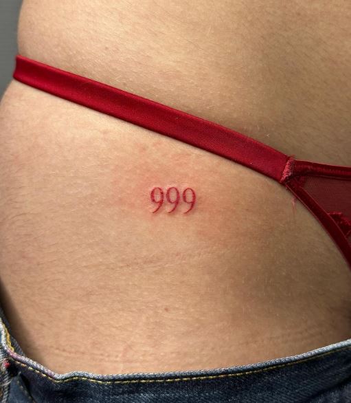 Minimalistic Red 999 Hip Tattoo