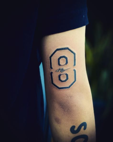 No. 8 with Autograph Arm Tattoo