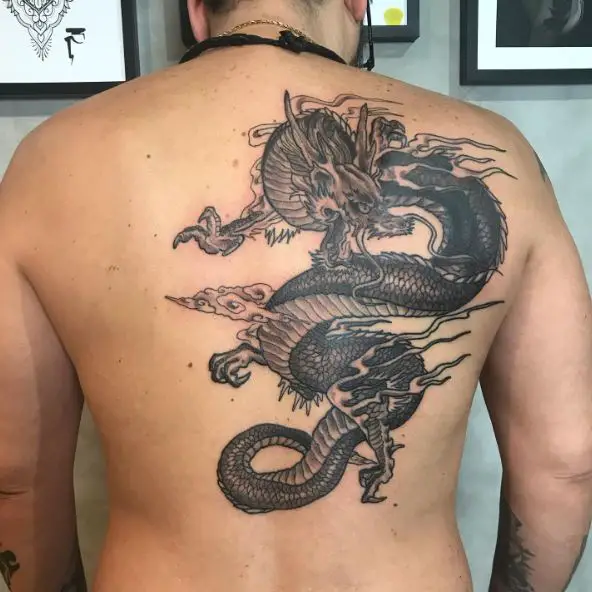 Black and Grey Angry Dragon Back Tattoo