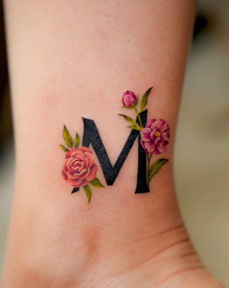 Black Bold Initial Letter M with Flowers Wrist Tattoo