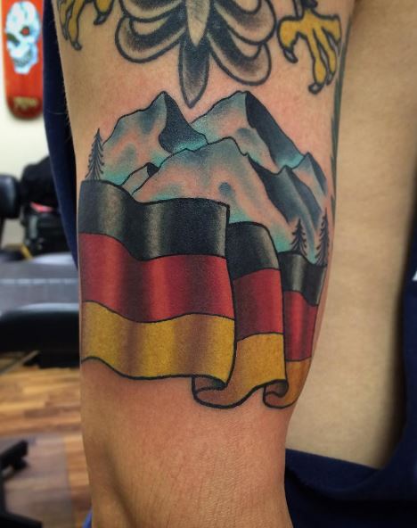 Colorful Alps and German Flag Arm Tattoo