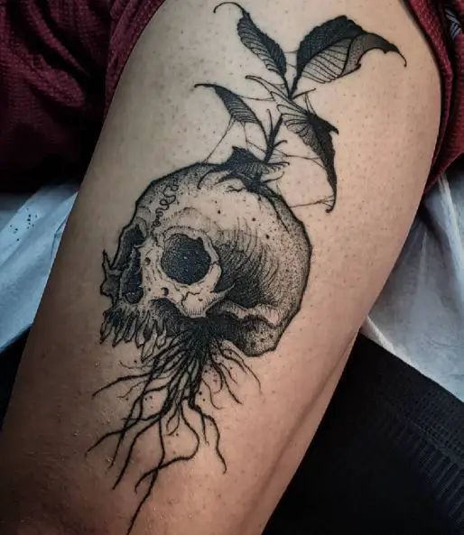 Plant with Leaves and Roots and Skull Arm Tattoo