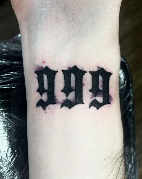 Minimalistic Gothic Font 999 Wrist Tattoo