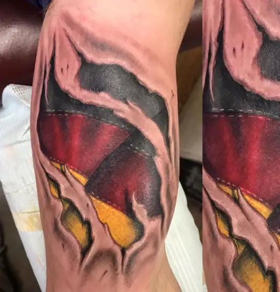 Torn Skin German Flag Arm and Ribs Tattoo