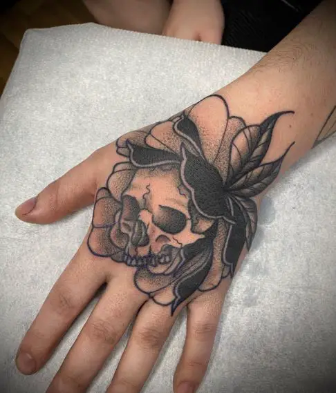 Black and Grey Flower and Skull Hand Tattoo