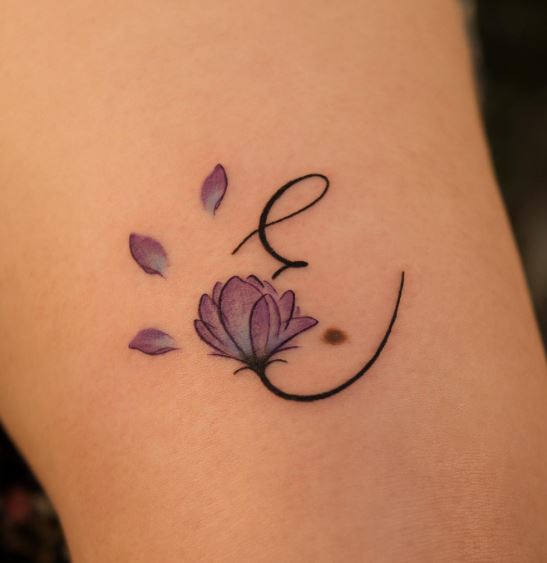 Black Initial Letter E with Purple Flower Arm Tattoo