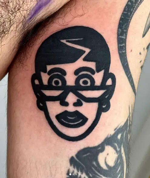 Black Bad Bunny with Glasses Inner Biceps Tattoo