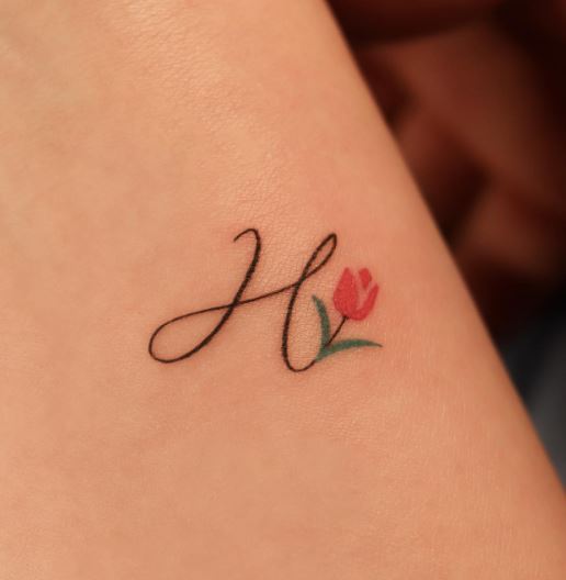 Handwritten Initial Letter H with Flower Forearm Tattoo