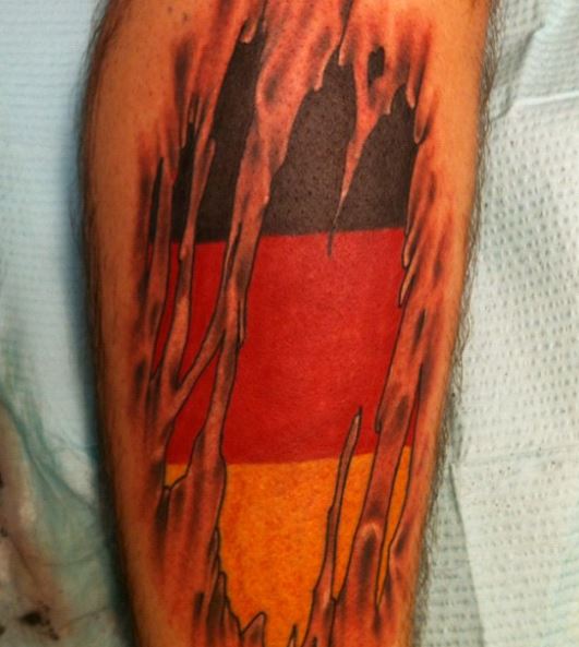 Torn Skin German Flag Leg Tattoo