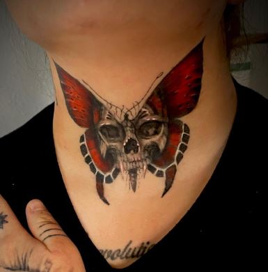 Butterfly and Skull Throat Tattoo