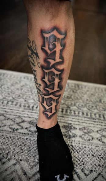 Black Shaded 999 Leg Tattoo