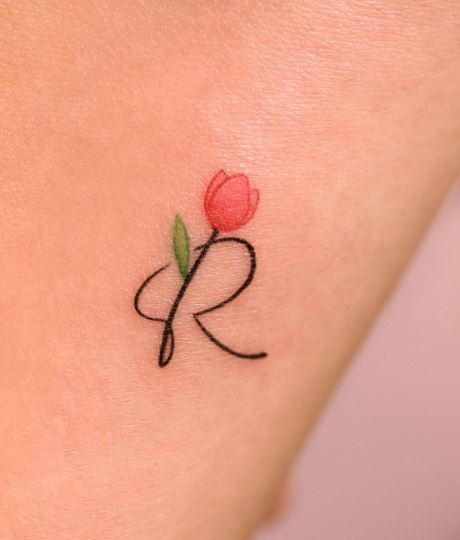 Handwritten Initial Letter R with Flower Forearm Tattoo