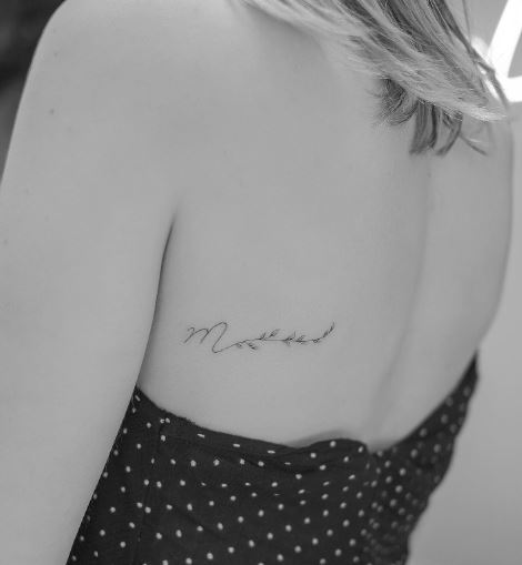 Handwritten Initial Letter M with Vines Back Tattoo