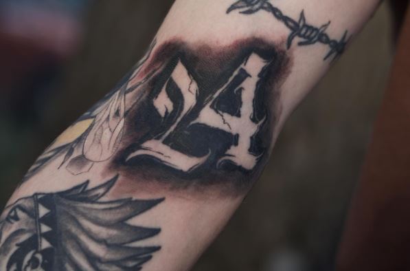 Barbed Wire and No. 24 Arm Tattoo